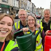 Knaresborough in Bloom organisers celebrate the town winning Five Roses in the prestigious Golden Rose category of the Yorkshire in Bloom awards. (Picture contributed)
