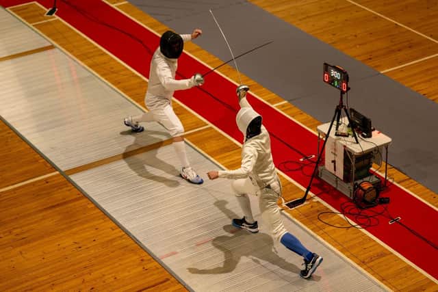 Men's epee in action!