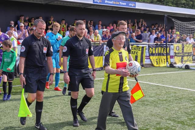 Johnny Walker leads out the teams at Wetherby Road ahead of the 2018/19 National League fixture between Harrogate Town and Gateshead.