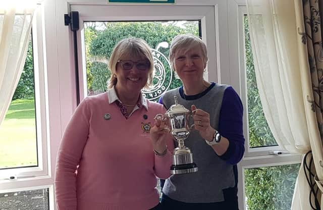 Pannal GC's Ladies' Captain Clare Davies, left, and Admin Secretary Debbie Bruce celebrate the halved Captains v Secretaries match. Picture: Submitted