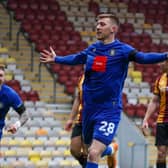 Matty Daly celebrates after firing Harrogate Town into an early lead during Saturday's FA Cup first-round victory at Bradford City. Pictures: Matt Kirkham