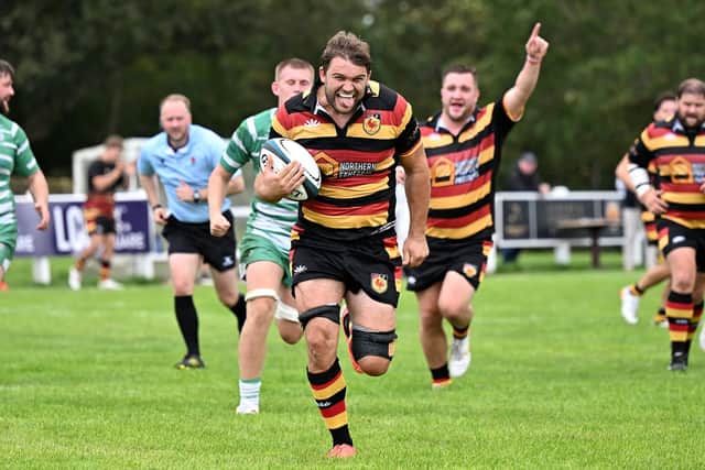 Will Hill runs clear to score Harrogate RUFC's third try during Saturday's National Two North success over Billingham RUFC. Picture: Daniel Kerr