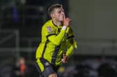 Josh March celebrates after putting Harrogate Town 2-0 up against Doncaster Rovers. Pictures: Matt Kirkham