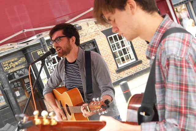 Harrogate musician  Rufus Beckett, left, has organised an all-day gig this weekend at The Disappearing Chin pub. Here he is pictured a few years ago on stage at Feva festival in Knaresborough with Will McKenzie. (Picture National World 1708122AM5)