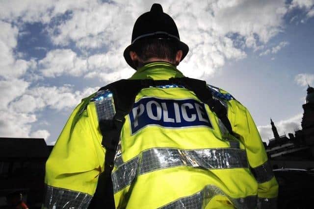 Three men have been charged with possessing a gun after a car was intercepted by police near Harrogate