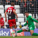 Harrogate Town goalkeeper Pete Jameson saves from Stevenage's Alex Gilbey during Saturday's League Two clash at the Lamex Stadium. Pictures: Matt Kirkham