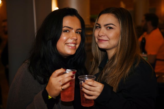 Maya Singh and Cristina Dobre enjoying a pint at the festival