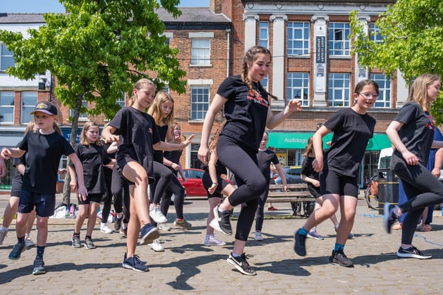 Young dancers on Ripon's market square pull off their best performance. Street performers in partnership with Little Bird Artisan Market