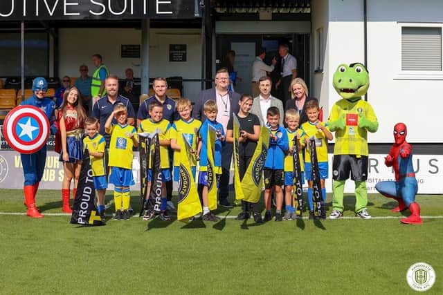 New sponsorship deal - Harrogate Town AFC with Homes Together and members of Harrogate Town Junior Supporters Club. (Picture contributed)