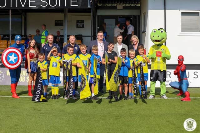 New sponsorship deal - Harrogate Town AFC with Homes Together and members of Harrogate Town Junior Supporters Club. (Picture contributed)