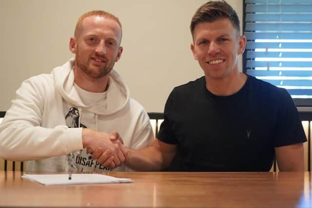 Liam Gibson, left, is welcomed to Harrogate Town by Lloyd Kerry, the Sulphurites' head of recruitment.