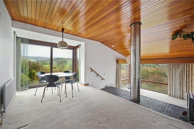 The dining and living rooms open out to the viewing platform - a strong feature of the property.