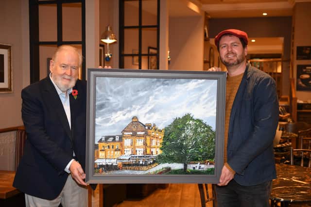 Harrogate man David Palmer and artist Paul Mirfin with a painting of a tree that King Charles planted in Harrogate year ago. The painting is a present to King Charles for his birthday from David. (Picture Gerard Binks)