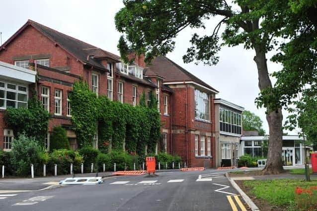 A fourth girl has been arrested after a female member of staff was assaulted at King James's School in Knaresborough