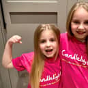 Holly and Heidi Hair are cutting and donating their hair to help raise money for the Candlelighters charity