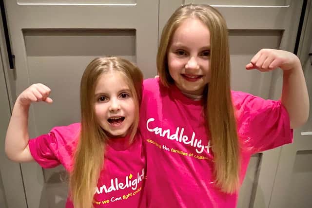 Holly and Heidi Hair are cutting and donating their hair to help raise money for the Candlelighters charity