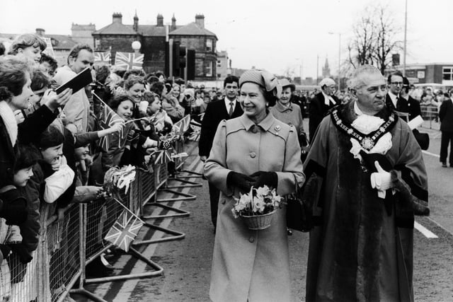 Her Majesty the Queen accompanied by the Mayor of Harrogate on her walkabout in Station Parade