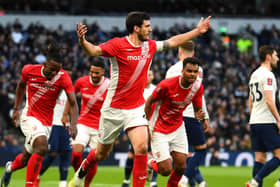 Anthony O'Connor celebrates after scoring an FA Cup goal for League One Morecambe against Premier League Tottenham Hotspur last season. Picture: Alex Davidson/Getty Images