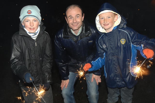 Lewis Murray, Terry Hodgson and Rob Hodgson playing with their sparklers at the Harrogate Stray Bonfire in 2009