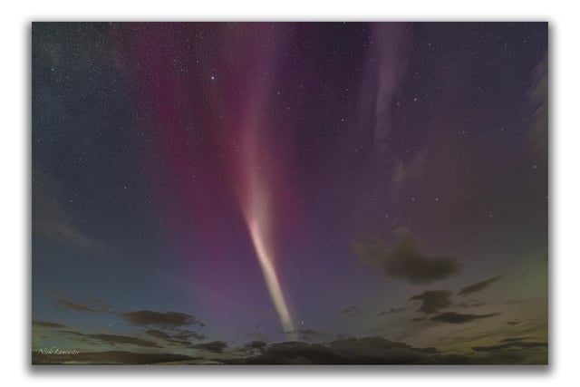 However, it is not the only phenomenon in the night sky. The white strip pictured, is known as STEVE.