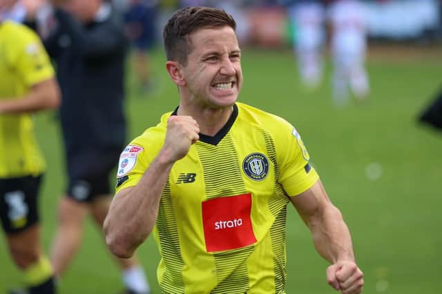Harrogate Town captain Josh Falkingham celebrates following the final whistle of Saturday's League Two clash with Hartlepool United. Pictures: Matt Kirkham