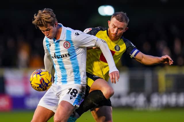 George Thomson, right, scored a stoppage-time winner for Harrogate Town the last time Accrington Stanley visited Wetherby Road. The sides go head-to-head again in North Yorkshire this Saturday. Picture: Malcolm Bryce/ProSportsImages