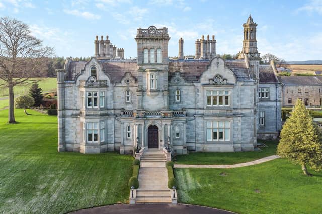 A front view of the palatial property in which an apartment is for sale.