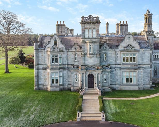 A front view of the palatial property in which an apartment is for sale.