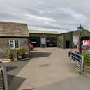 Councillors have delayed making a decision on expanding a garage near the village of Hampsthwaite in Harrogate