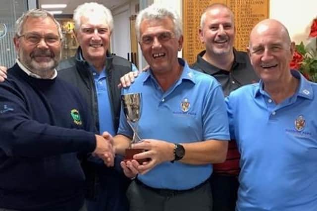 Rudding Park GC team members are presented with Harrogate Area Rabbits Golf Association Invitational Championships winners' trophy. Picture: Submitted