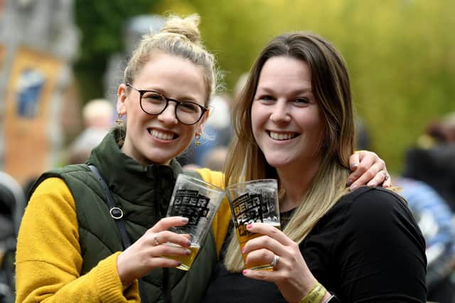 Joanna Firth and Susie Cox enjoying a pint of beer at the festival