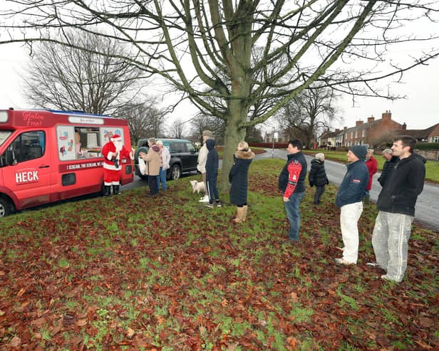 Supporting the community - HECK! ice cream van handing out free sausage and mash cones last Christmas in North Yorkshire. (PIcture contributed)