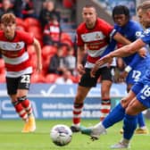 Jack Muldoon converts from the penalty spot to fire Harrogate Town to victory at Doncaster Rovers. Pictures: Matt Kirkham