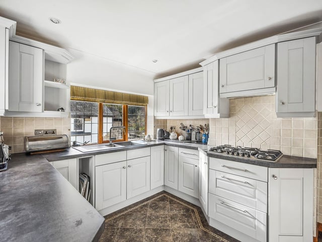 A modern, shaker-style kitchen.