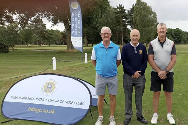 Oakdale GC members Steven Richardson, left, and Graham Whittington, right, with Alastair Davidson, have now played in more than 100 Harrogate Union competitions. Picture: Submitted