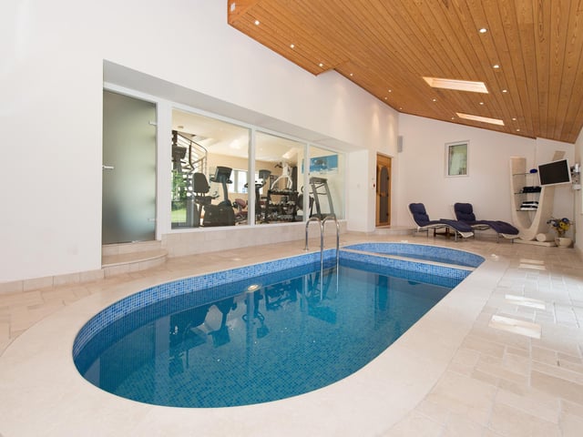 The spa pool within the leisure complex, with the gym visible to the rear left.