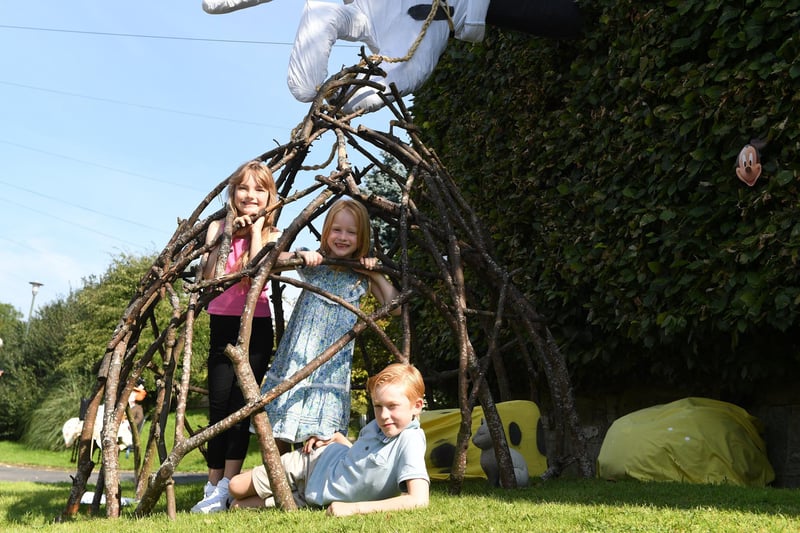 Charlie Harris (aged nine), Jessica Harris (aged seven) and Ella Rose (aged eight) enjoying a day out at the scarecrow festival