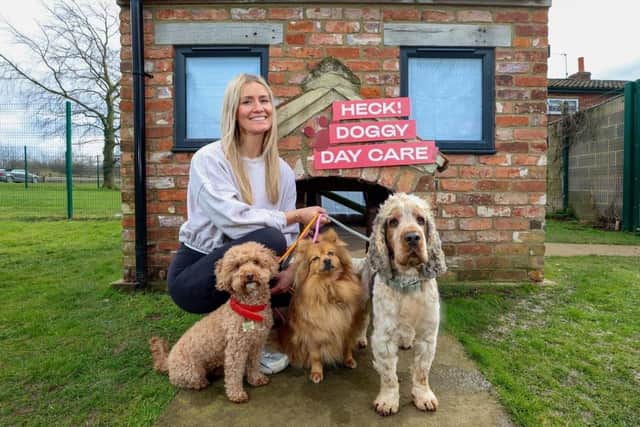 Pet friendly project - Becky Keeble embracing her new role as HECK!’s Head of Pooch Pampering and Canine Liaison Officer. (Picture contributed)