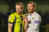 Liam Gibson, left, has not played for Harrogate Town since they were thrashed 5-1 by MK Dons in early October. Pictures: Matt Kirkham