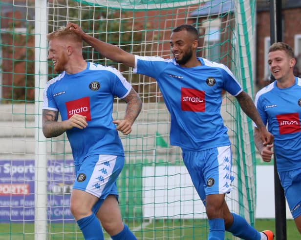 Terry Kennedy, left, celebrates after opening the scoring in Harrogate Town's 2-0 National League North win at Blyth Spartans in August 2017. Picture: Matt Kirkham