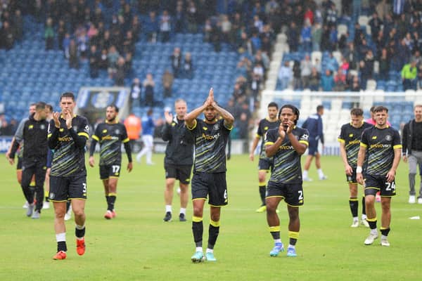 Harrogate Town's players applaud their travelling supporters following Saturday's 1-0 victory at Colchester United. Pictures: Matt Kirkham