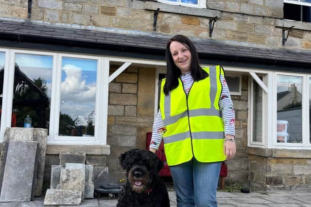 New manager Sam and her beautiful six-year-old Bouvier des Flanders, Bear outside The Nelson Inn in Harrogate.
