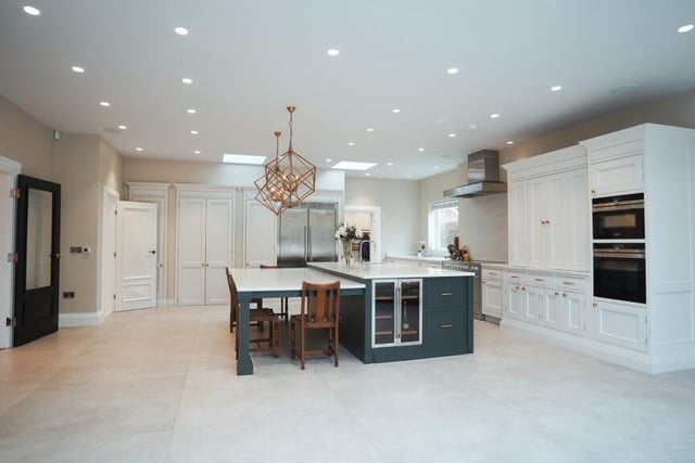 The spacious fitted kitchen with central island.