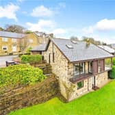 The four-bedroom detached home has an enviable location with glorious views.