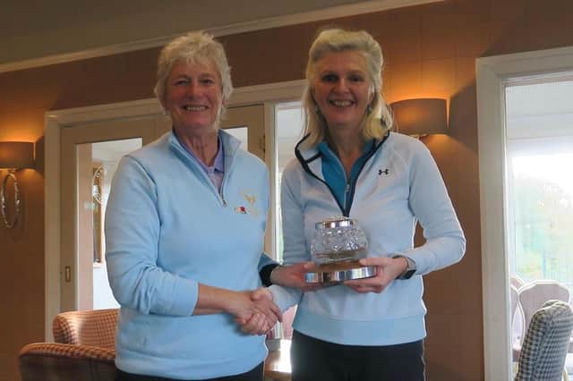Oakdale's lady captain Lynn Wood presents Carol Eardley with the Committee Cup. Pictures: Submitted