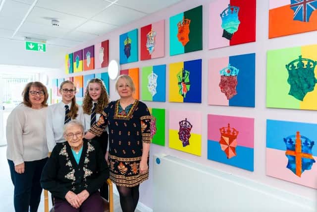 Sue Cawthray (CEO of Harrogate Neighbours), Bella and Maisie (St Aidan’s Church of England High School), Sarah Charneca (Artist) and Eva (Resident at The Cuttings) with the new art installation to commemorate the Coronation of King Charles III