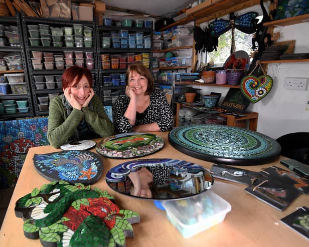 BAMM North mosaic artists Frances Taylor (left) and Flick Gillett with their work, at the Mosaic Mania studio in Otley. They are exhibiting their mosaics for home and garden at RHS Harlow Carr. Picture by Yorkshire Post photographer Simon Hulme.