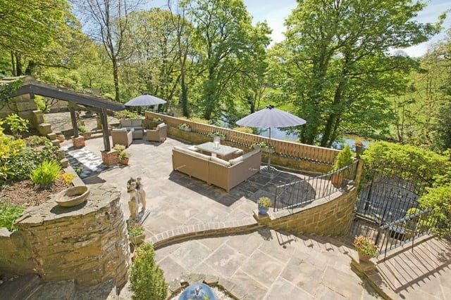 A fabulous sun-terrace garden overlooks the river.