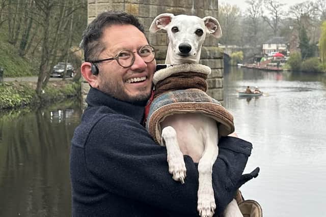 Knaresborough's Dr Joe Tay by the River Nidd with his dog Fergus who he really wanted in the picture!
