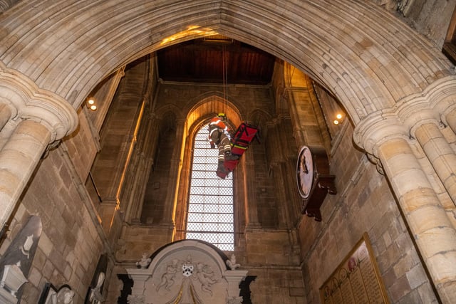 Verger Lucinda Taylor was strapped onto a stretcher and lowered 15 metres down to the cathedral floor from a trap door in the ringing room